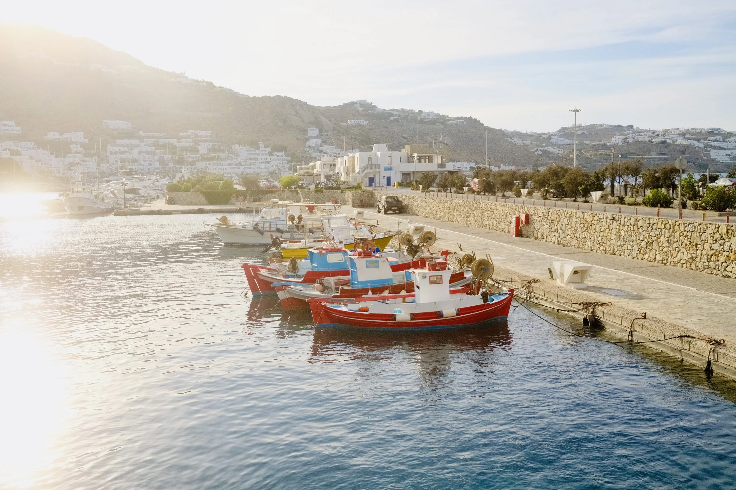 Small fishing boats moored in Mykonos harbor