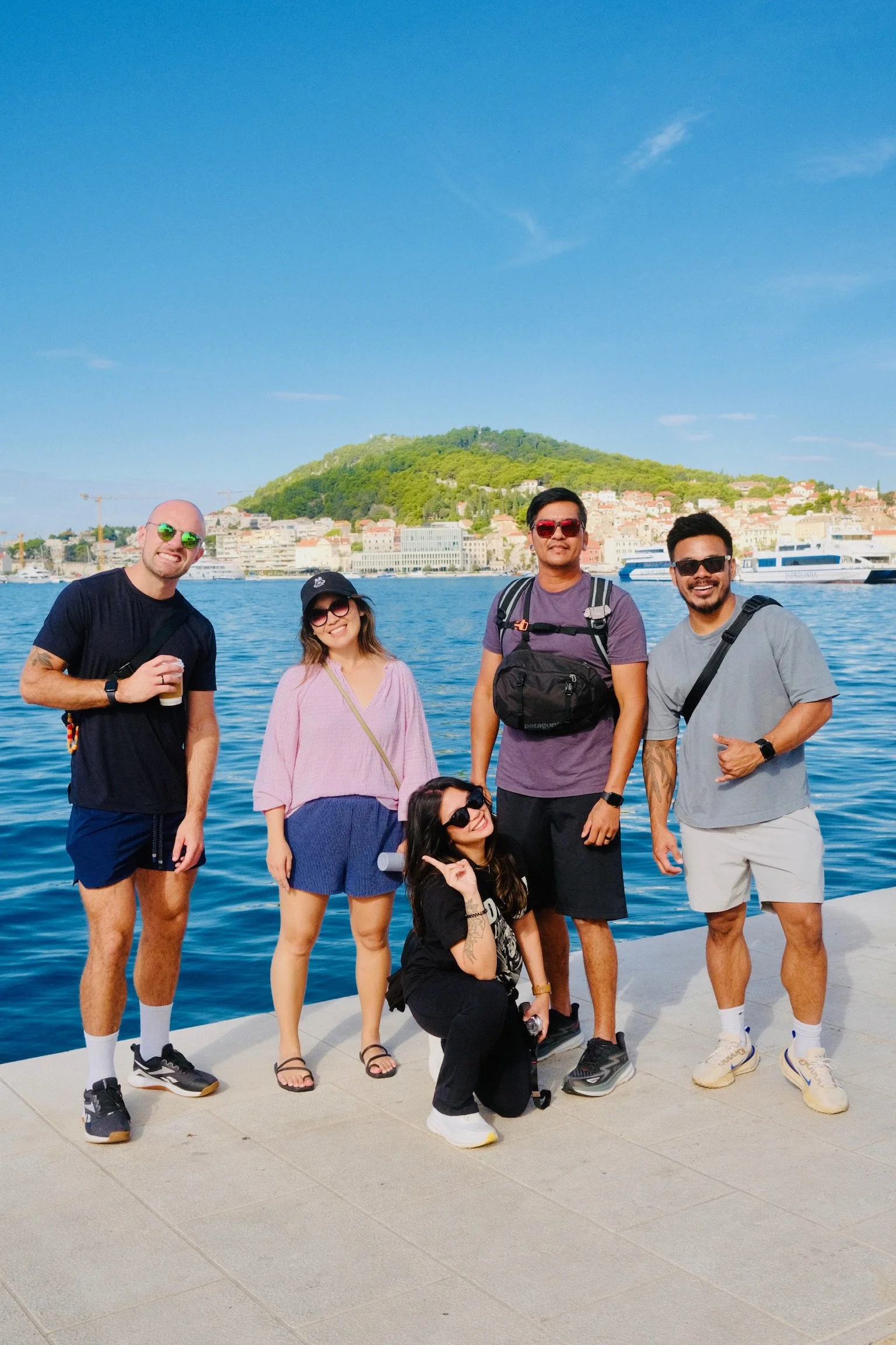 Friends posing together in Split, Croatia