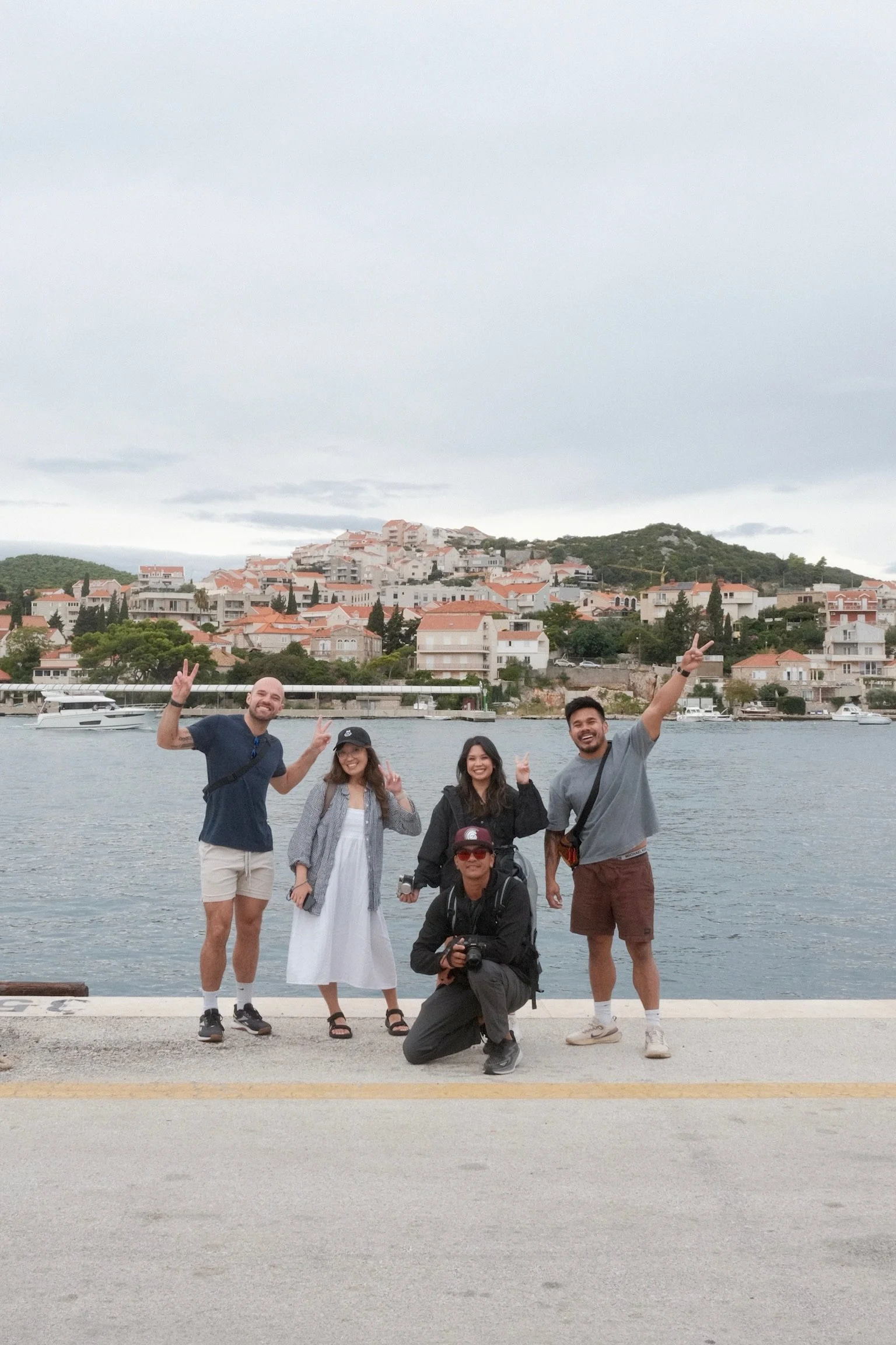Friends posing together in Dubrovnik Old Town, Croatia